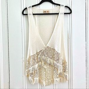 Cream colored sheer knit vest with crochet and tassel details. Hollister brand.